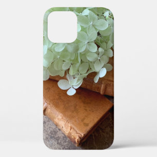 Fresh hydrangeas on old books iPhone 12 pro case