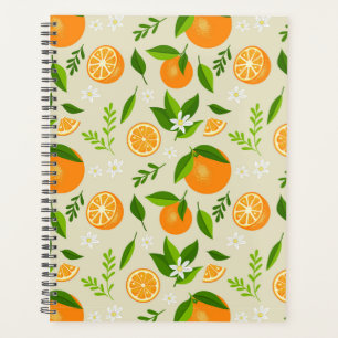 Fresh oranges with flowers and leaves planner