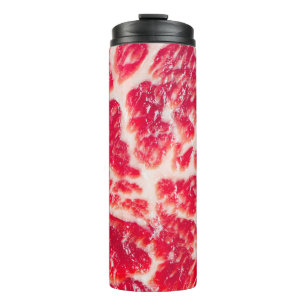 Fresh raw beef steak marbled meat texture close up thermal tumbler