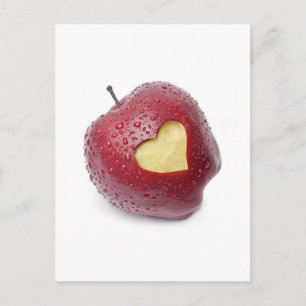 Fresh red apple with a heart shaped symbol postcard
