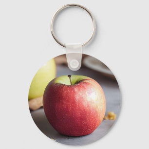 Fresh red apples on the table, apple pie crumbs key ring