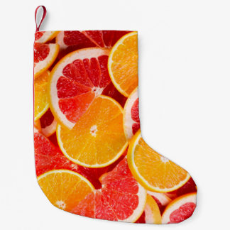 Fresh ripe orange and grapefruit backgroundbackgro small christmas stocking