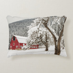 Fresh snow on red barn decorative cushion