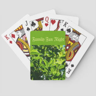 Fresh spring green leaves, family fun night playing cards