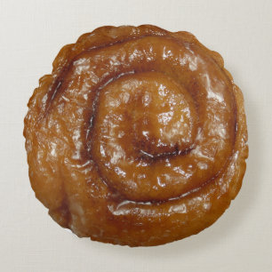 Fresh warm glazed cinnamon roll round pillow