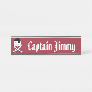 Friendly Smiling Pirate with Crossed Swords on Red Desk Name Plate