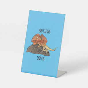 Frilled-neck lizard cartoon illustration pedestal sign