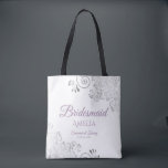 Frilly Silver & Lavender Bridesmaid White Wedding Tote Bag<br><div class="desc">These Bridesmaid tote bags are designed as favors or gifts for wedding bridesmaids. Great swag bag to fill with favors and gifts. The simple yet elegant design features silver gray frills in the corners with fancy lavender purple colored script lettering. There is space for her name, as well as the...</div>