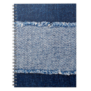 Fringed denim blue jeans frame. notebook