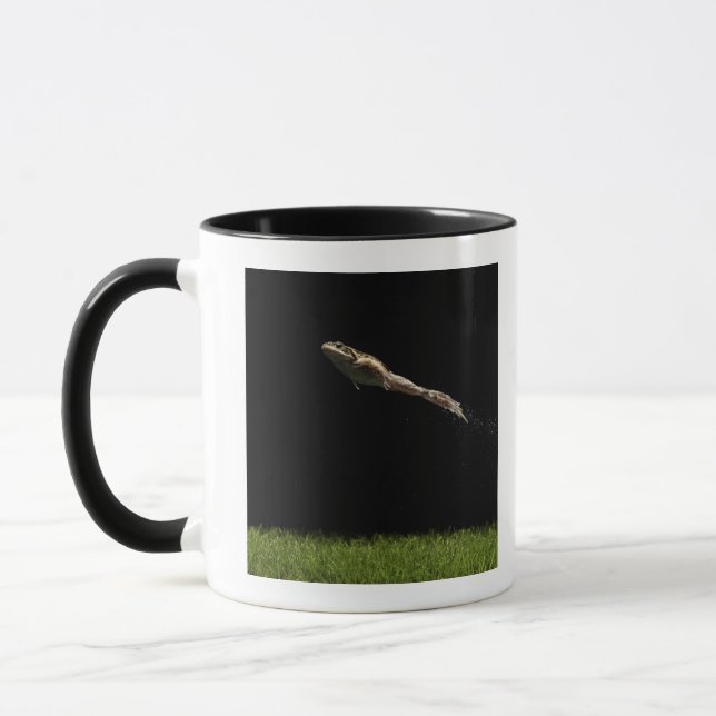 frog leaping off fresh green grass mug (Left)