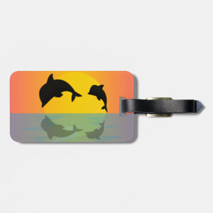 Frollocking Dolphins at Sunset Luggage Tag