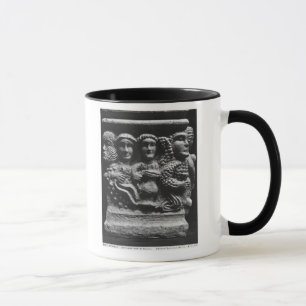 Front of an altar used as a font depicting mug