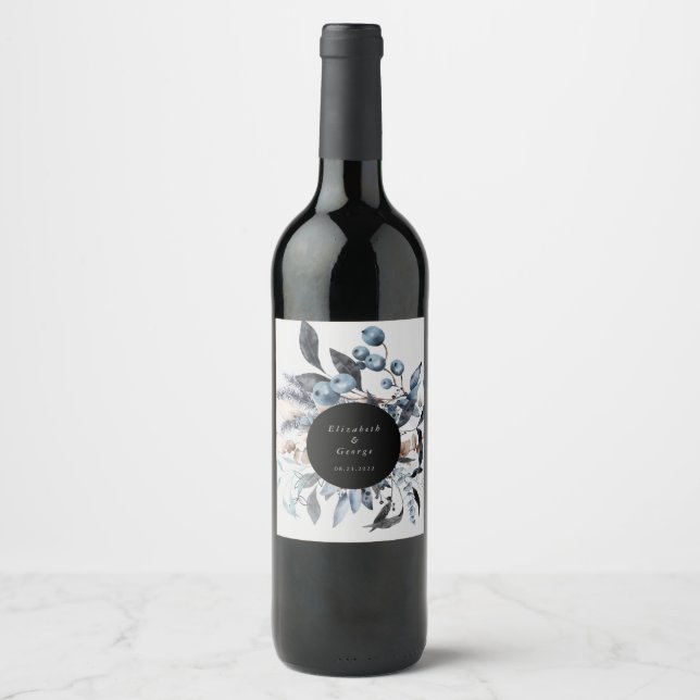 frosty dusty blue winter floral monogram wedding wine label (Front)