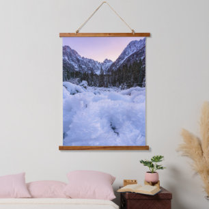Frozen foliage and mountains at sunset hanging tapestry
