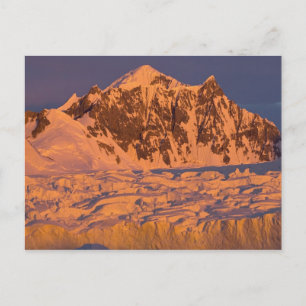 frozen glacial mountain landscape along the postcard