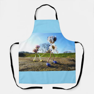 Fubbies in nature with daisy. apron
