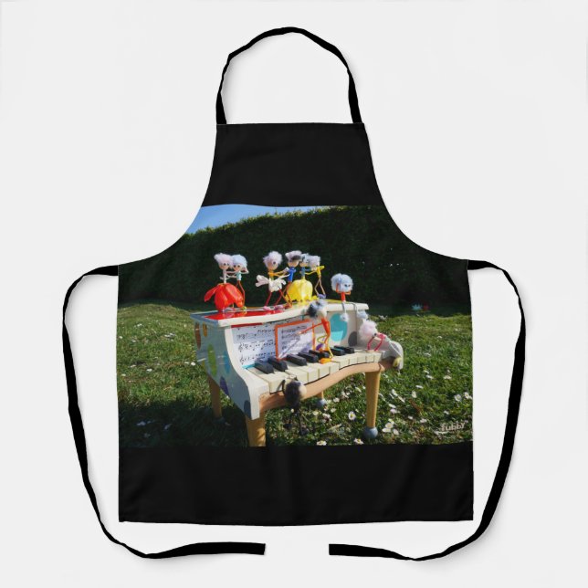 Fubbies on the piano making and dancing music. apron (Front)