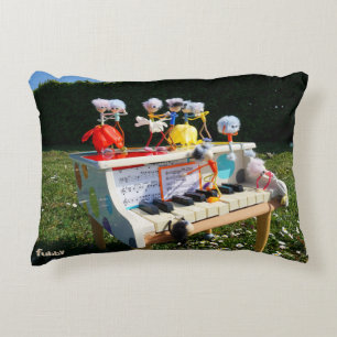 Fubbies on the piano making and dancing music. decorative cushion