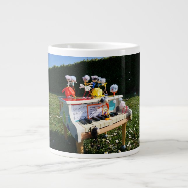 Fubbies on the piano making and dancing music. large coffee mug (Front)
