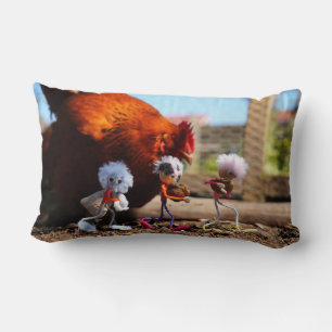 Fubby playing with the chickens and rooster. lumbar cushion