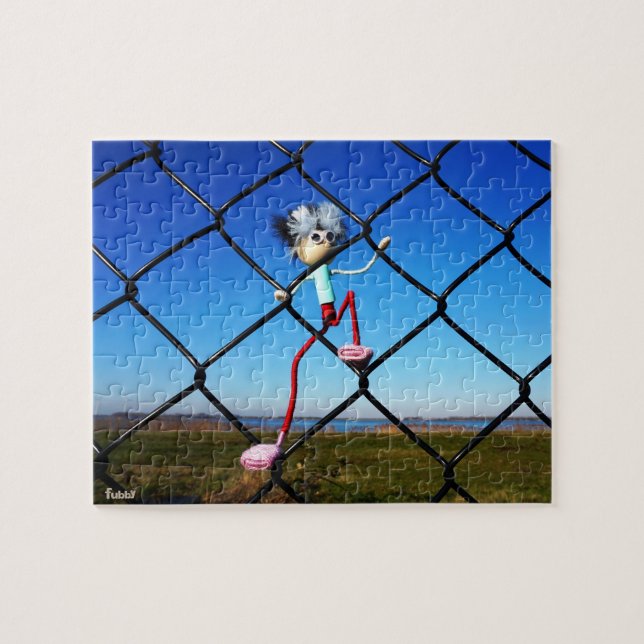Fubby puppet climbing up the fence. jigsaw puzzle (Horizontal)