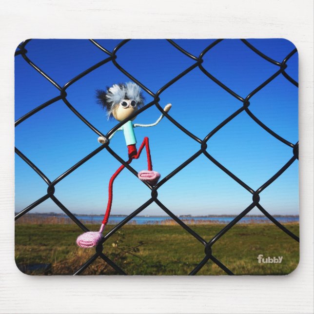 Fubby puppet climbing up the fence. mouse pad (Front)