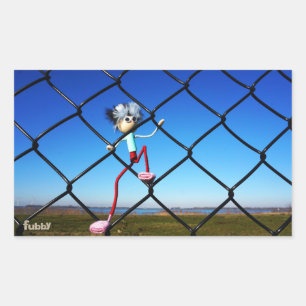 Fubby puppet climbing up the fence. rectangular sticker