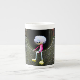 Fubby puppetry sitting in a wall. bone china mug