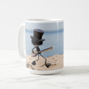 Fubby rock guitarist with hat on the beach. coffee mug
