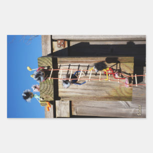 Fubby's climbing a birdhouse. rectangular sticker