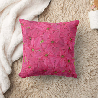 Fuchsia coloured poinsettias, floral pattern cushion
