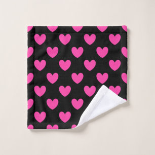 Fuchsia pink polka hearts on black wash cloth