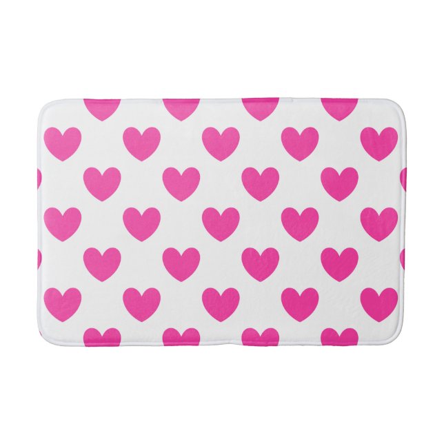 Fuchsia pink polka hearts on white bath mat (Front)