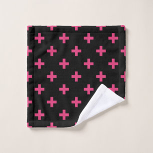 Fuchsia polka crosses on black wash cloth