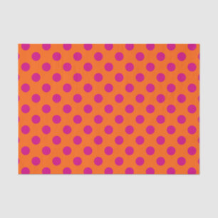 Fuchsia polka dots on orange tissue paper