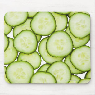 Full frame of sliced cucumber, on white mouse pad