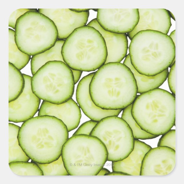 Full frame of sliced cucumber, on white square sticker (Front)