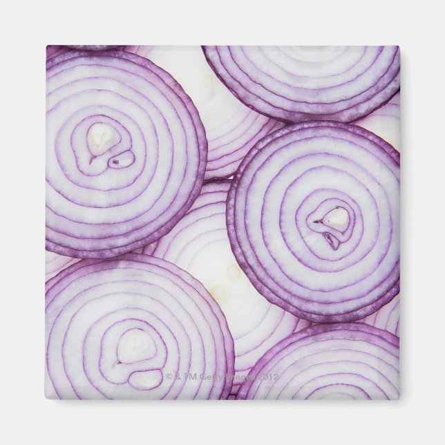Full frame of sliced red onion, on white magnet (Front)