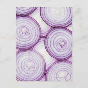Full frame of sliced red onion, on white postcard