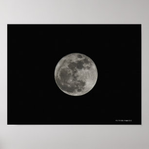 Full moon against night sky poster