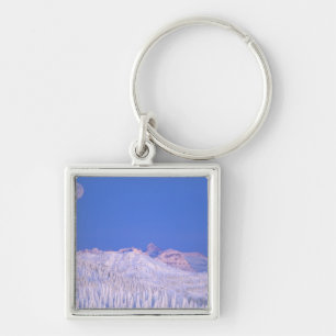 Full moon rising above Glacier National Park Key Ring