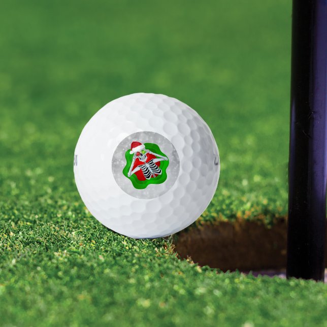 Fun Christmas Skeleton Ornament Eyes in Splatter Golf Balls (fun Christmas Skeleton with Ornament eyeballs Santa hat in red and green spatter on golf balls.)