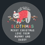 fun colourful sloth christmas classic round sticker<br><div class="desc">celebrate hanging out and chilling this christmas with this fun sloth design. Have a peaceful relaxed holiday season at a slower pace. Featuring a cute cartoon sloth with your message in colourful bold text making it extra special! part of a collection</div>