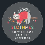 fun colourful sloth christmas classic round sticker<br><div class="desc">celebrate hanging out and chilling this christmas with this fun sloth design. Have a peaceful relaxed holiday season at a slower pace. Featuring a cute cartoon sloth with your message in colourful bold text making it extra special! part of a collection</div>