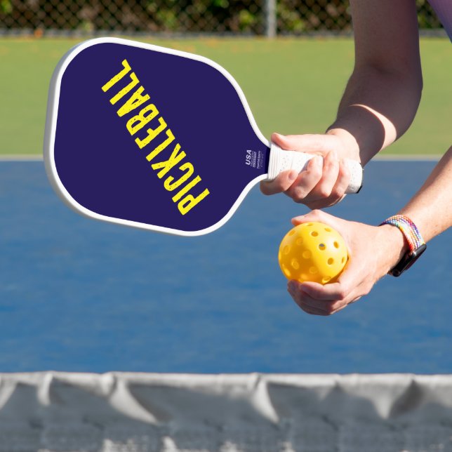 Fun Cool 90s Yellow Diagonal Text On Navy Blue Pickleball Paddle (Insitu)