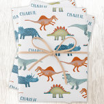 Fun Dinosaur Personalised Name Wrapping Paper Sheet<br><div class="desc">Fun and unique personalised dinosaur design featuring T Rex,  Triceratops,  Spinosaurus,  Stegosaur and your child's name to make them feel really special.  Original art by Nic Squirrell.</div>