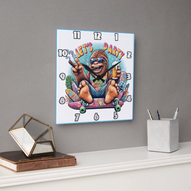 Fun-loving gorilla celebrating on a skateboard square wall clock (Office)