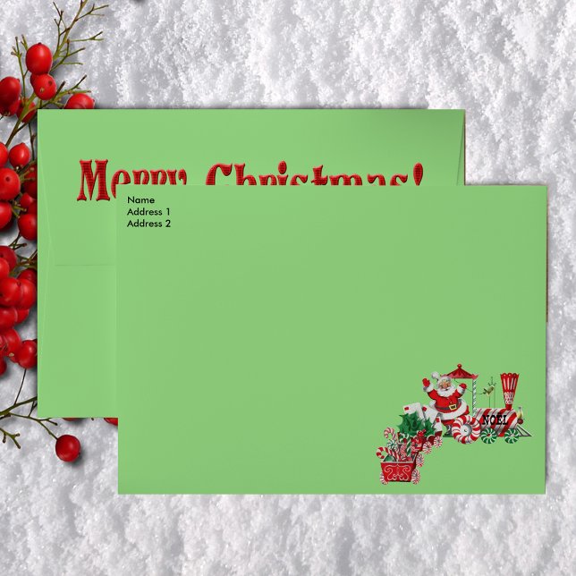 Fun Merry Christmas Santa on Candy Train Letters  Envelope (Santa Clause riding Merry Christmas train, candy canes letters to Santa on green holiday envelopes.)