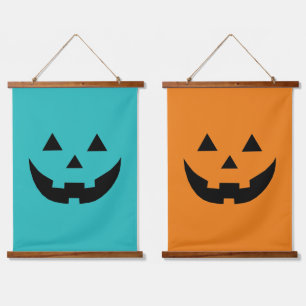 Fun orange and teal Jack o lantern face Halloween Hanging Tapestry
