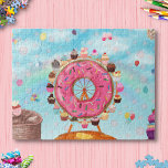 Fun Pink Doughnut Ferris Wheel and Cupcakes Jigsaw Puzzle<br><div class="desc">If life were a piece of cake, this is exactly what it would look like: a delicious fair! This illustration depicts a beautiful Ferris Wheel made from a pink glazed doughnut, tiny cupcakes, and a pancake with butter and syrup. Many colourful balloons are flying in a bright blue sky with...</div>